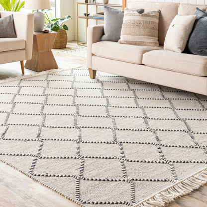 Uttar UTT-2301 Rug by Surya in black, cream. Made from 70% wool, 30% polyester in a unique style.