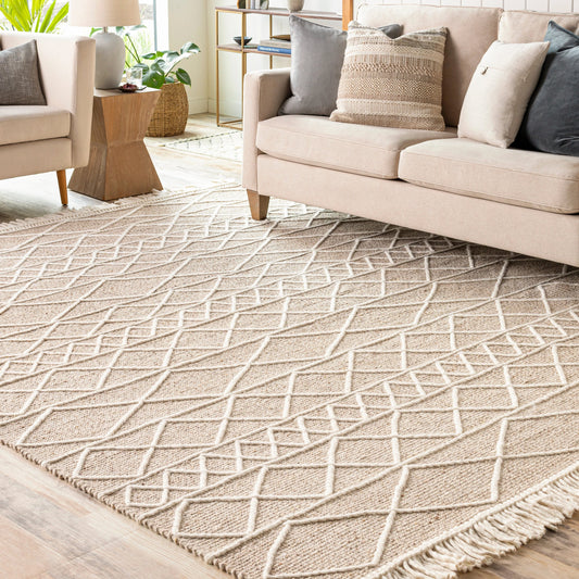 Uttar Rug - 29320 by Surya in medium brown, cream, tan. Made from 70% wool, 30% polyester in a unique style.