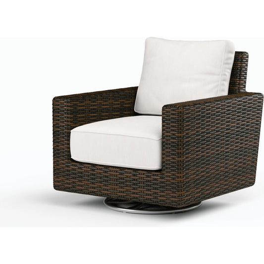 Montecito Outdoor Swivel Rocker Club Chair by Sunset West in cognac. Made from resin wicker in a modern style.