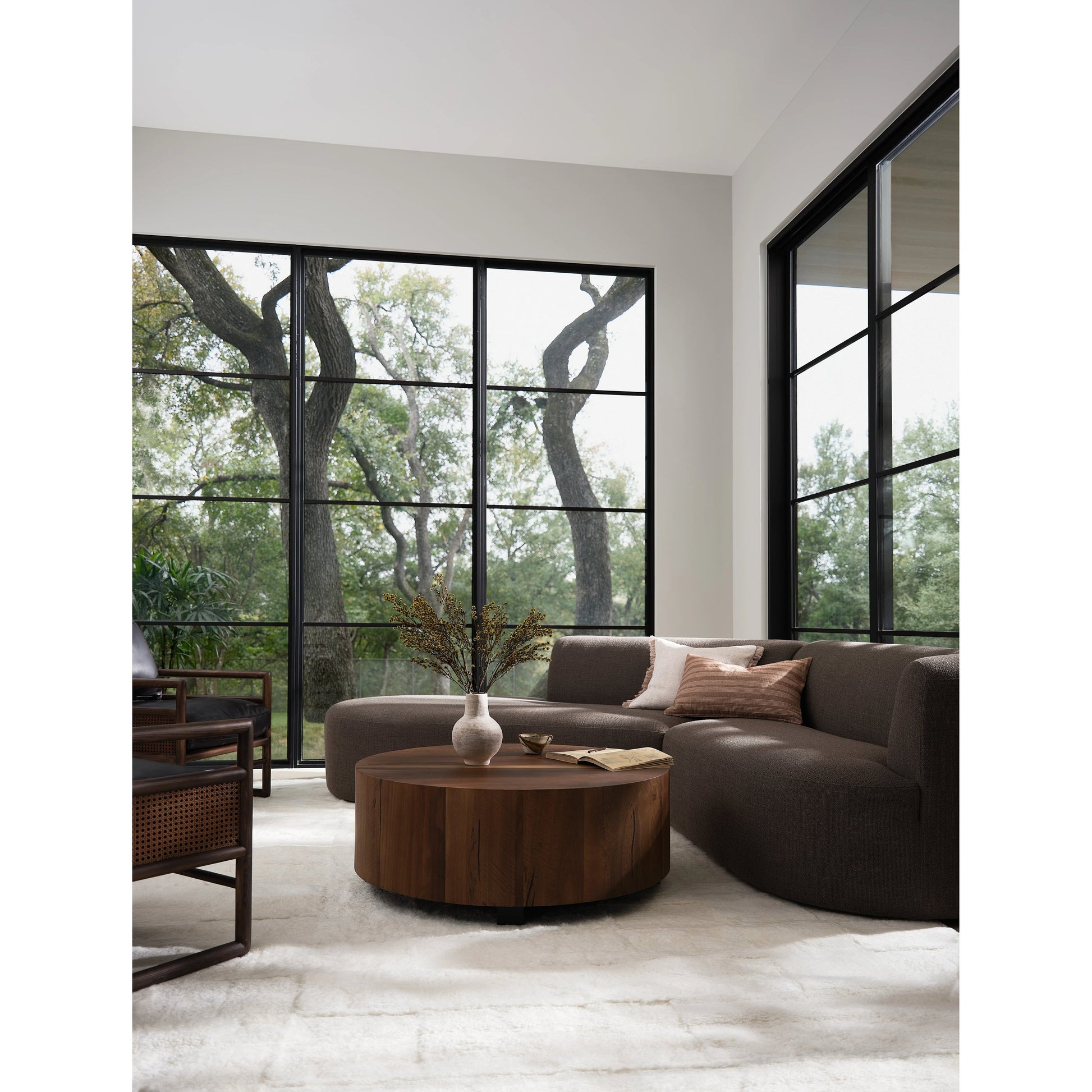 Hudson Round Coffee Table by Four Hands. Made from unique in a cottage & farmhouse style.