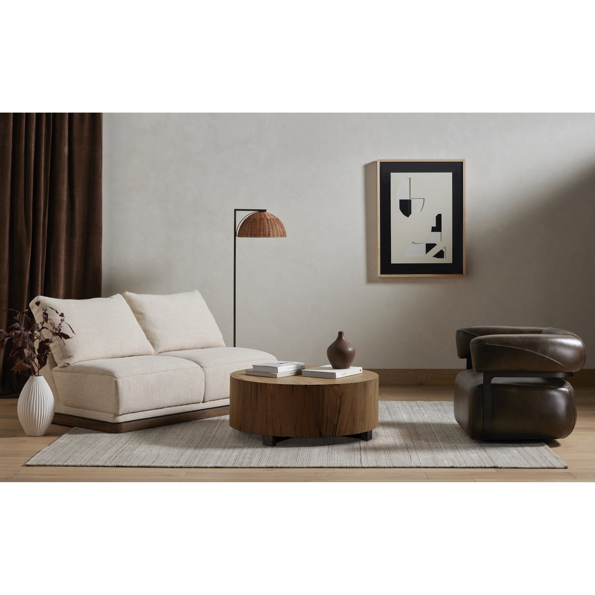 Hudson Round Coffee Table by Four Hands. Made from unique in a cottage & farmhouse style.