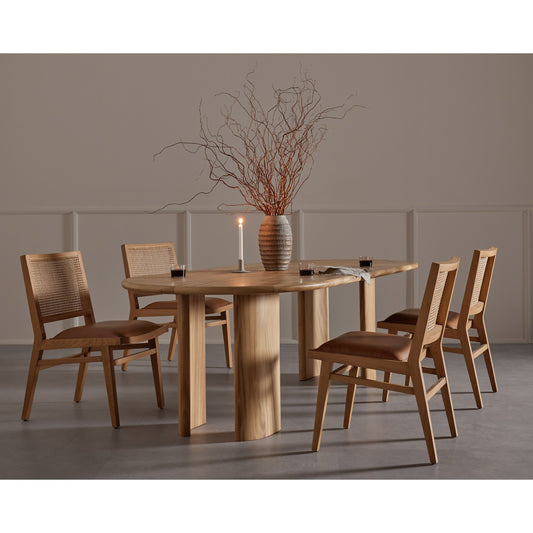 Lunas Oval Dining Table by Four Hands in gold guanacaste. Made from thick guanacaste veneer in a rustic style.