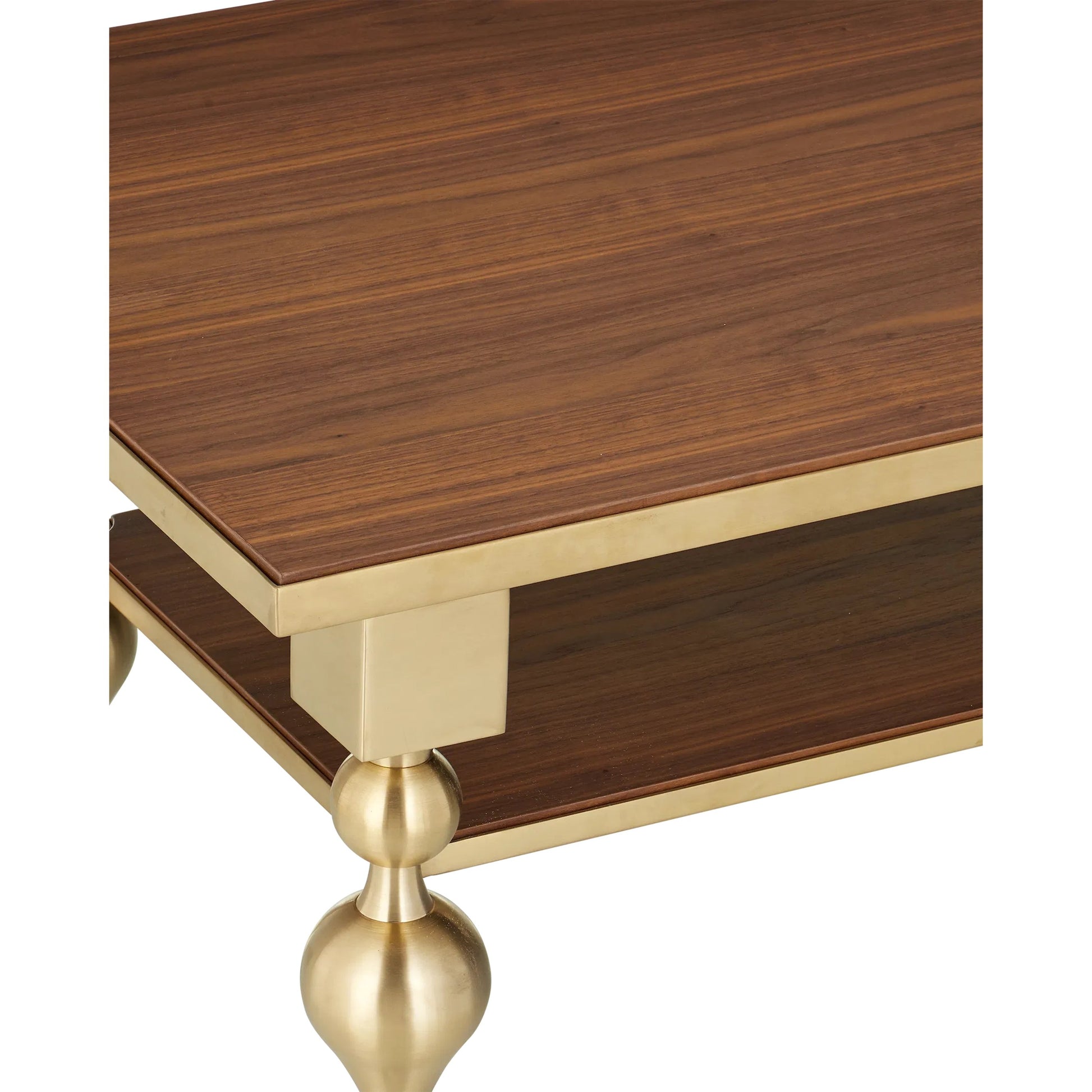 Maeve Cocktail Table by Currey and Company in brushed brass, walnut. Made from stainless steel, walnut veneer, engineered wood in a modern style.