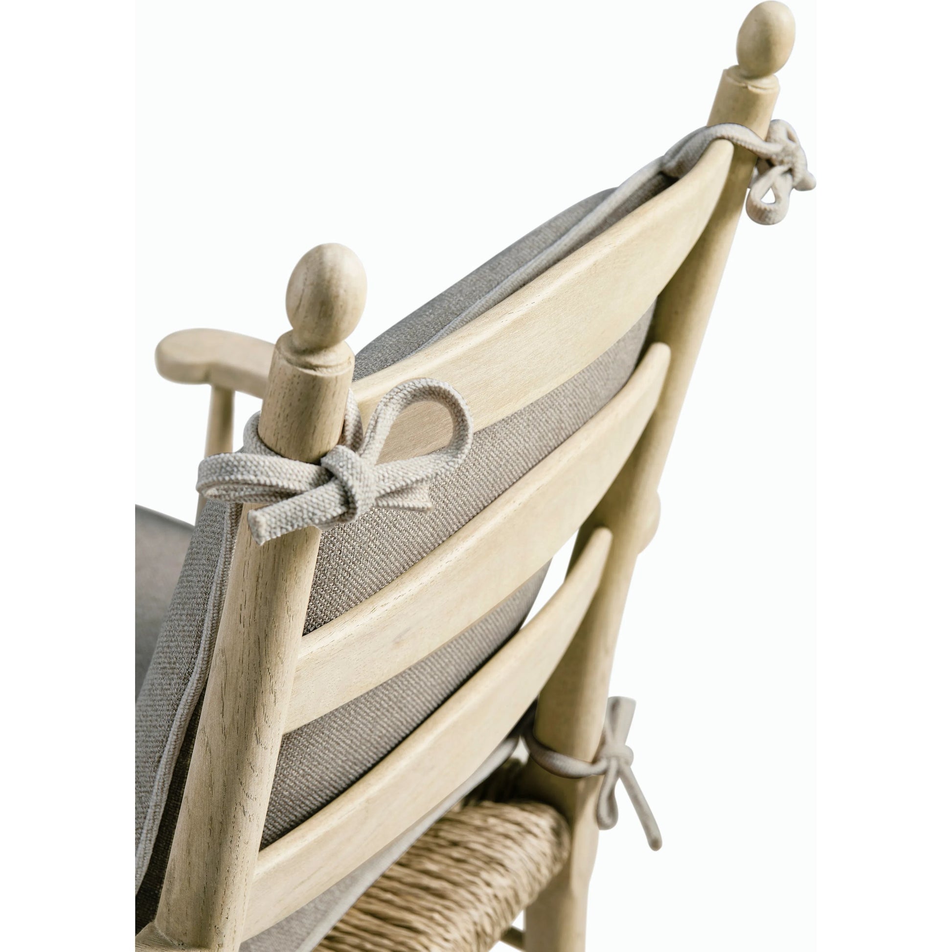 Timeless Doppler Ladderback Arm Chair by Jonathan Charles in stripped brown chestnut. Made from oak, fiber rush, foam, fabric in a coastal style.