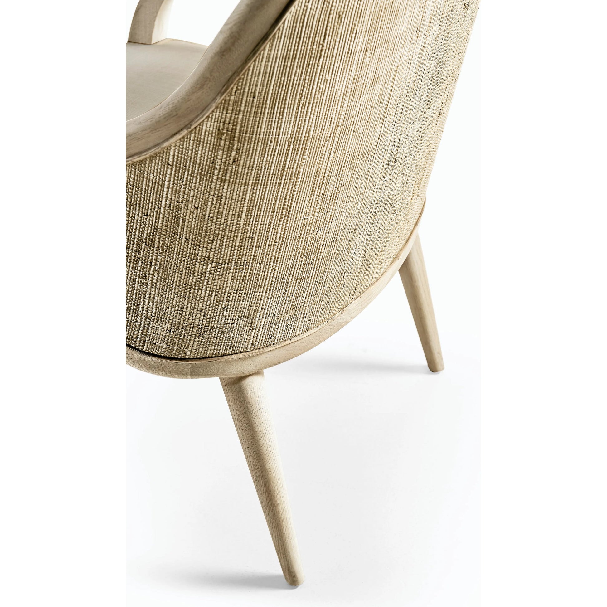 Water Basin Dining Arm Chair by Jonathan Charles in whitewash oak. Made from oak, foam, fabric, grass cloth in a modern style.