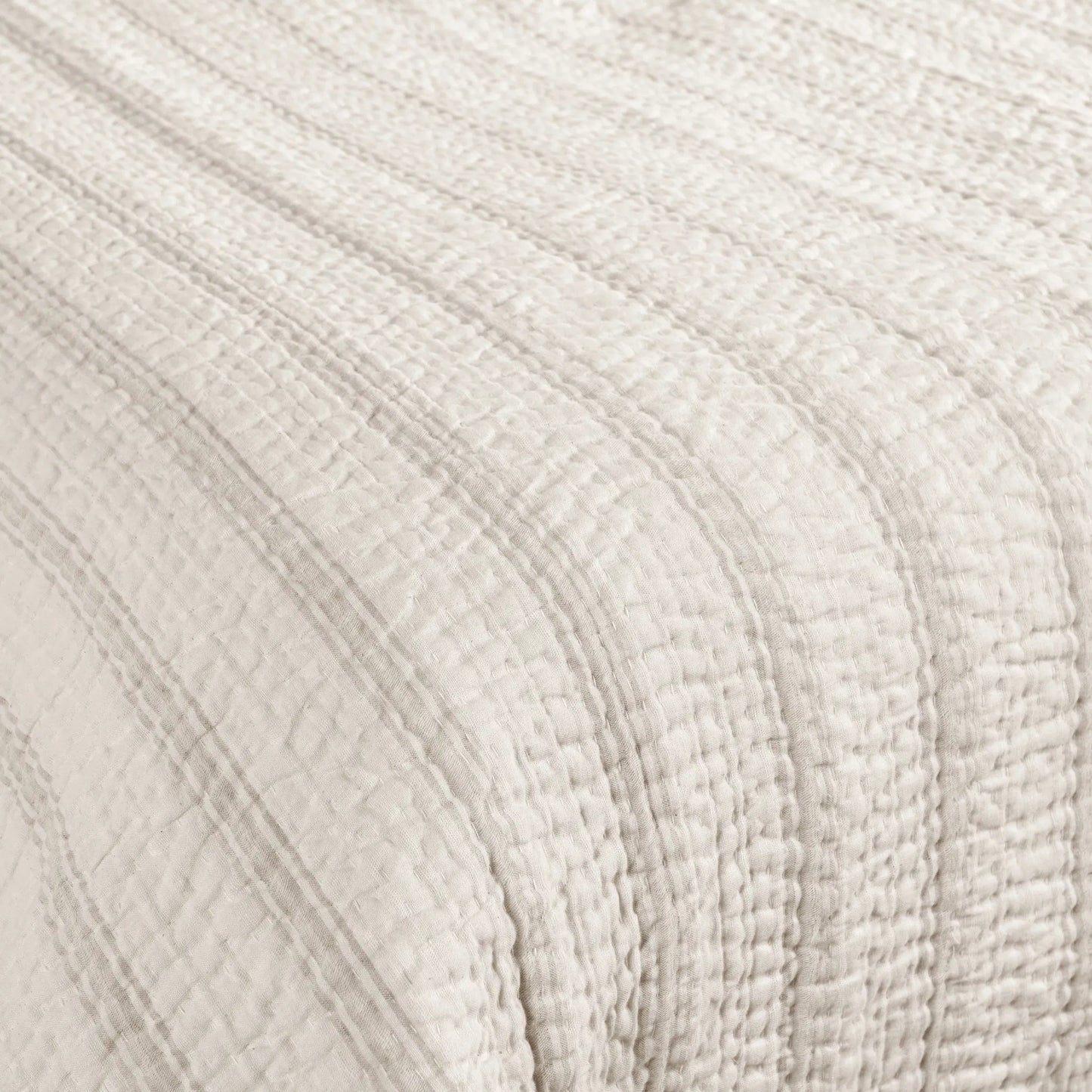 002 SI-2223158 | Closeup | Abraham Cotton Linen Eggshell Beige King Quilt by Villa by Classic Home. Made from 50% linen/50% cotton, 100% cotton back fabric and fill in a transitional style.