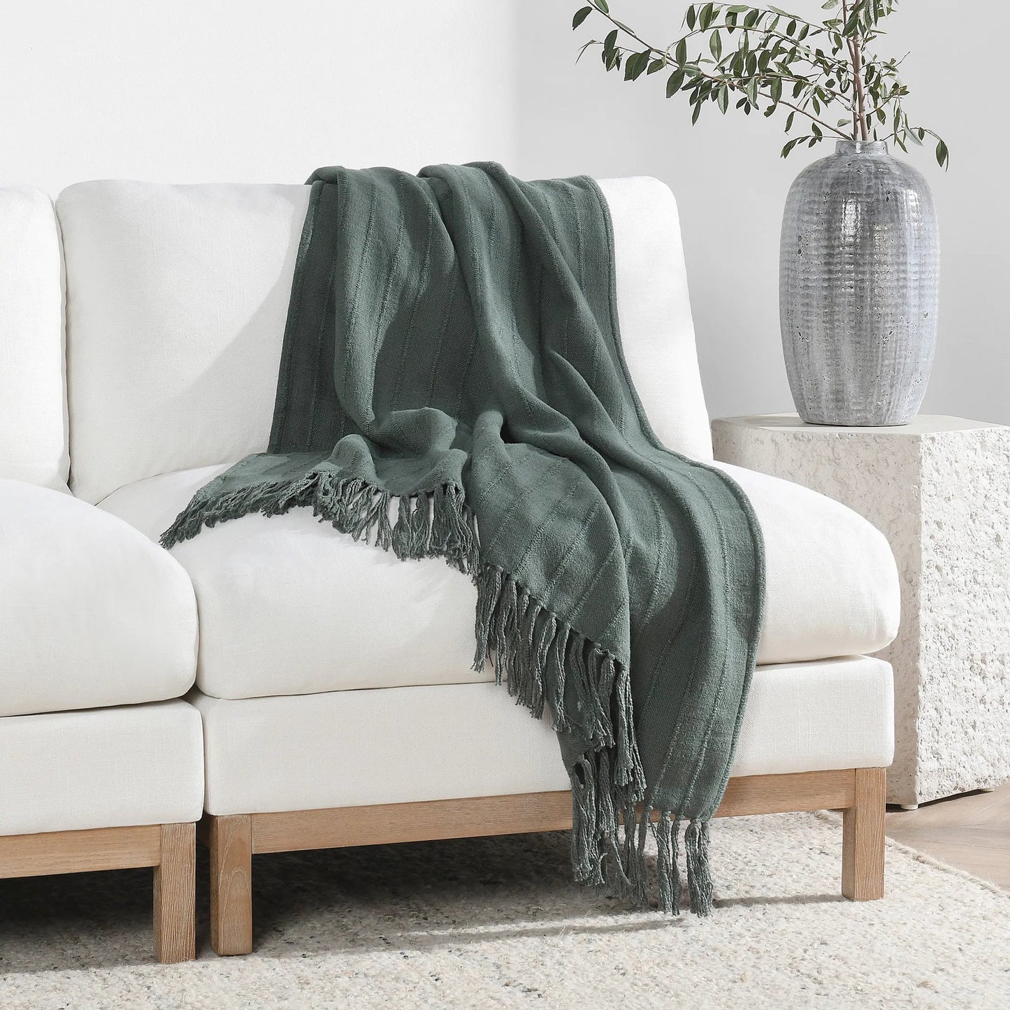 005 SI-2256351 | Lifestyle | Hunter Woven Fabric Forest Green Throw Blanket by Villa by Classic Home in green. Made from overdyed woven stripe design in a modern style.
