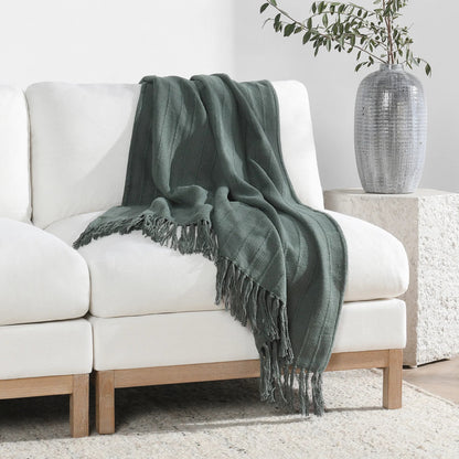 Hunter Woven Fabric Forest Green Throw Blanket by Villa by Classic Home in green. Made from overdyed woven stripe design in a modern style.