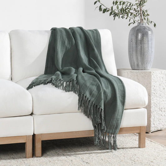 Hunter Woven Fabric Forest Green Throw Blanket by Villa by Classic Home in green. Made from overdyed woven stripe design in a unique style.
