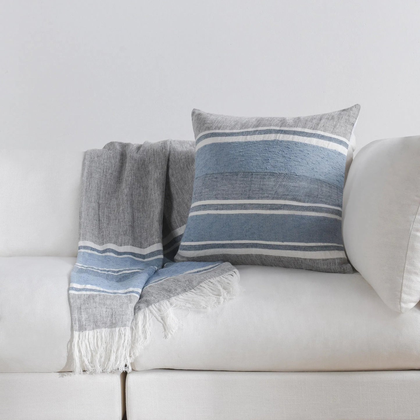 006 SI-2223180 | Lifestyle | Lima Belgian Linen Throw Blanket by Villa by Classic Home in capri blue, dark gray. Made from 100% belgian flax linen in a transitional style.