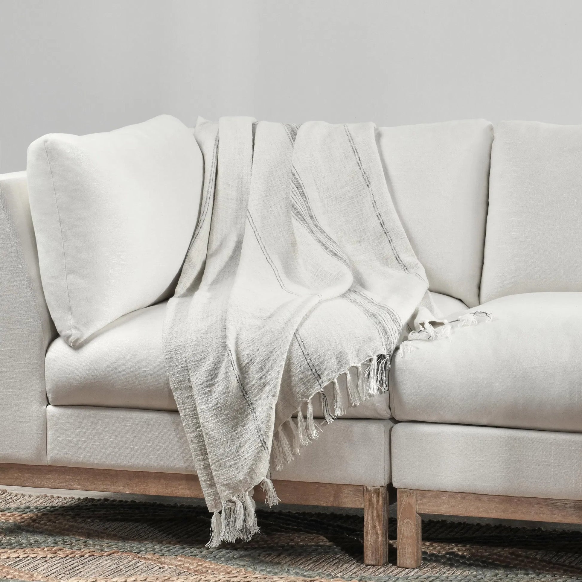Ria Throw Blanket by Villa by Classic Home in ivory, gray. Made from 60% cotton/40% linen in a transitional style.