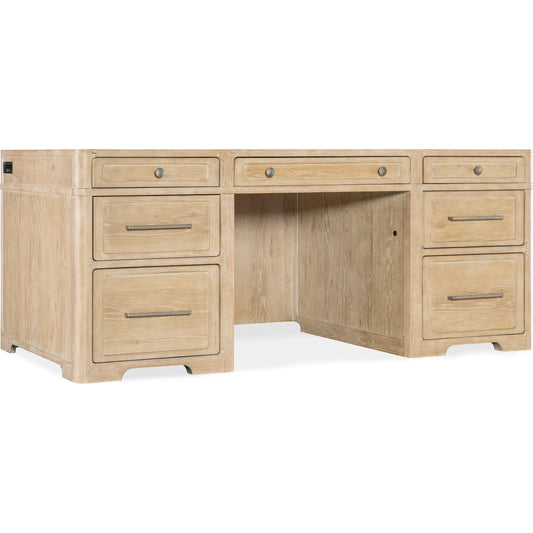 Retreat Executive Desk by Hooker Furniture in light wood. Made from oak, maple veneers, solid-wood edged top in a cottage & farmhouse style.