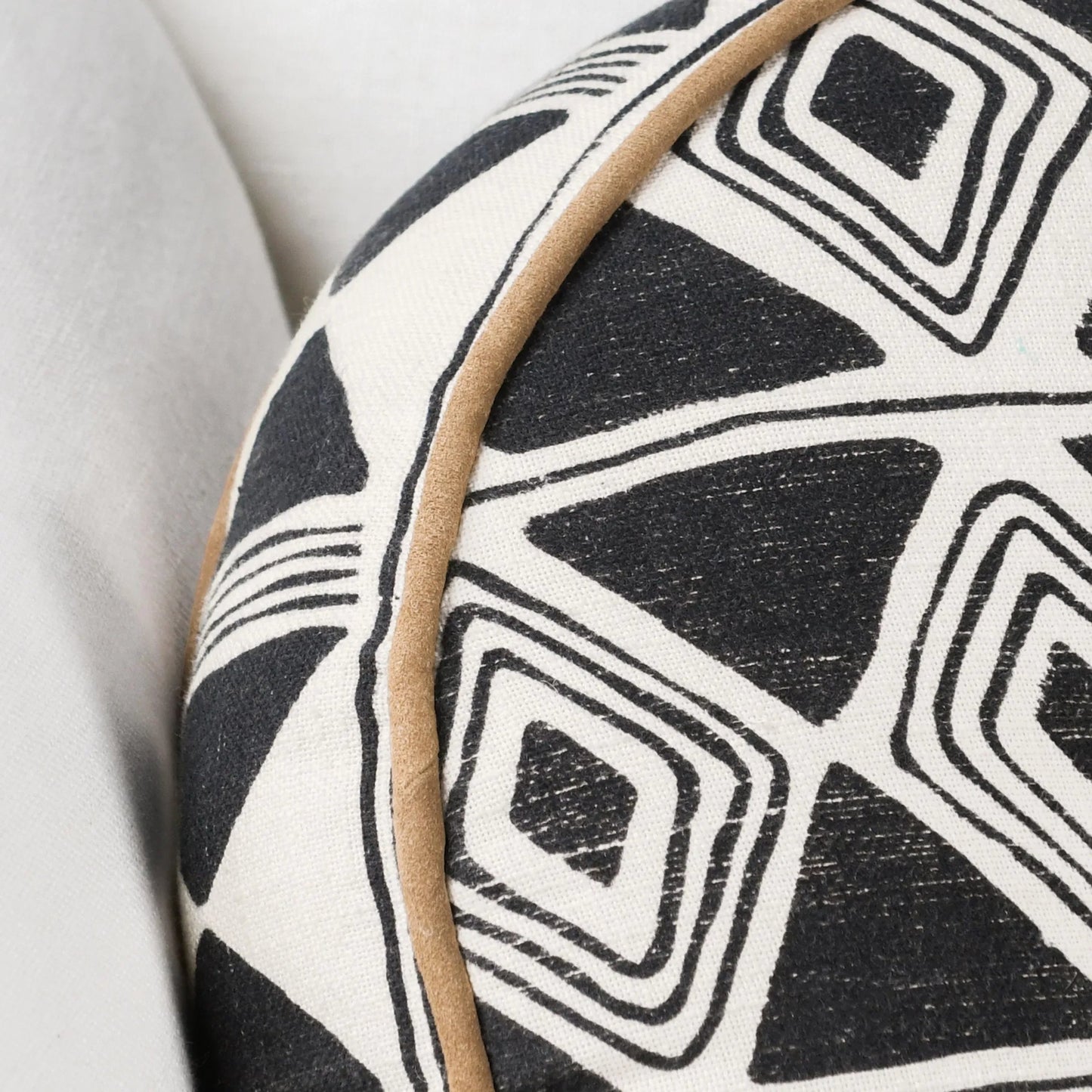 009 SI-2355349 | Closeup | Nubia Round Cotton Fabric Throw Pillow by Villa by Classic Home in black, white. Made from unique in a rustic style.