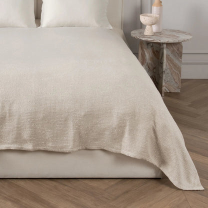 Anion Linen Blend Blanket by Villa by Classic Home in ivory. Made from 55% viscose, 18% linen, 18% cotton, 10% polyester in a unique style.