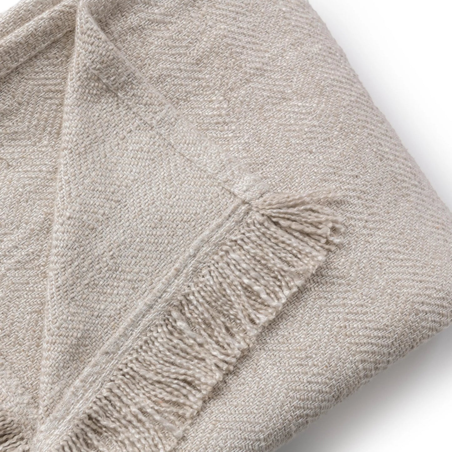 006 SI-2537827 | Closeup | Avani Linen Blend Blanket by Villa by Classic Home in natural. Made from 80% viscose, 20% linen in a unique style.