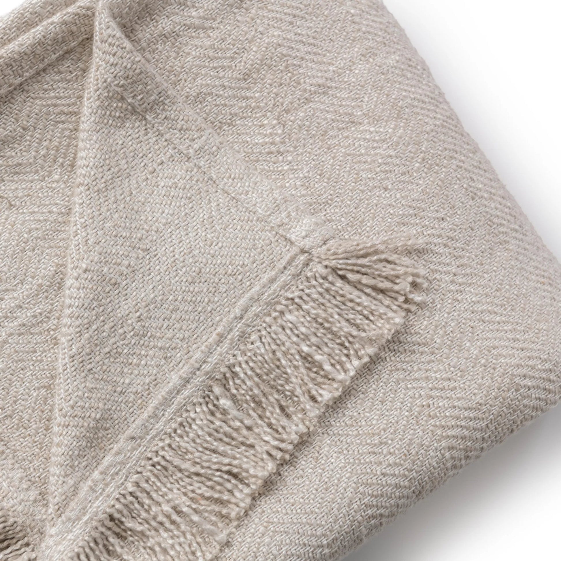 Avani Linen Blend Blanket by Villa by Classic Home in natural. Made from 80% viscose, 20% linen in a unique style.