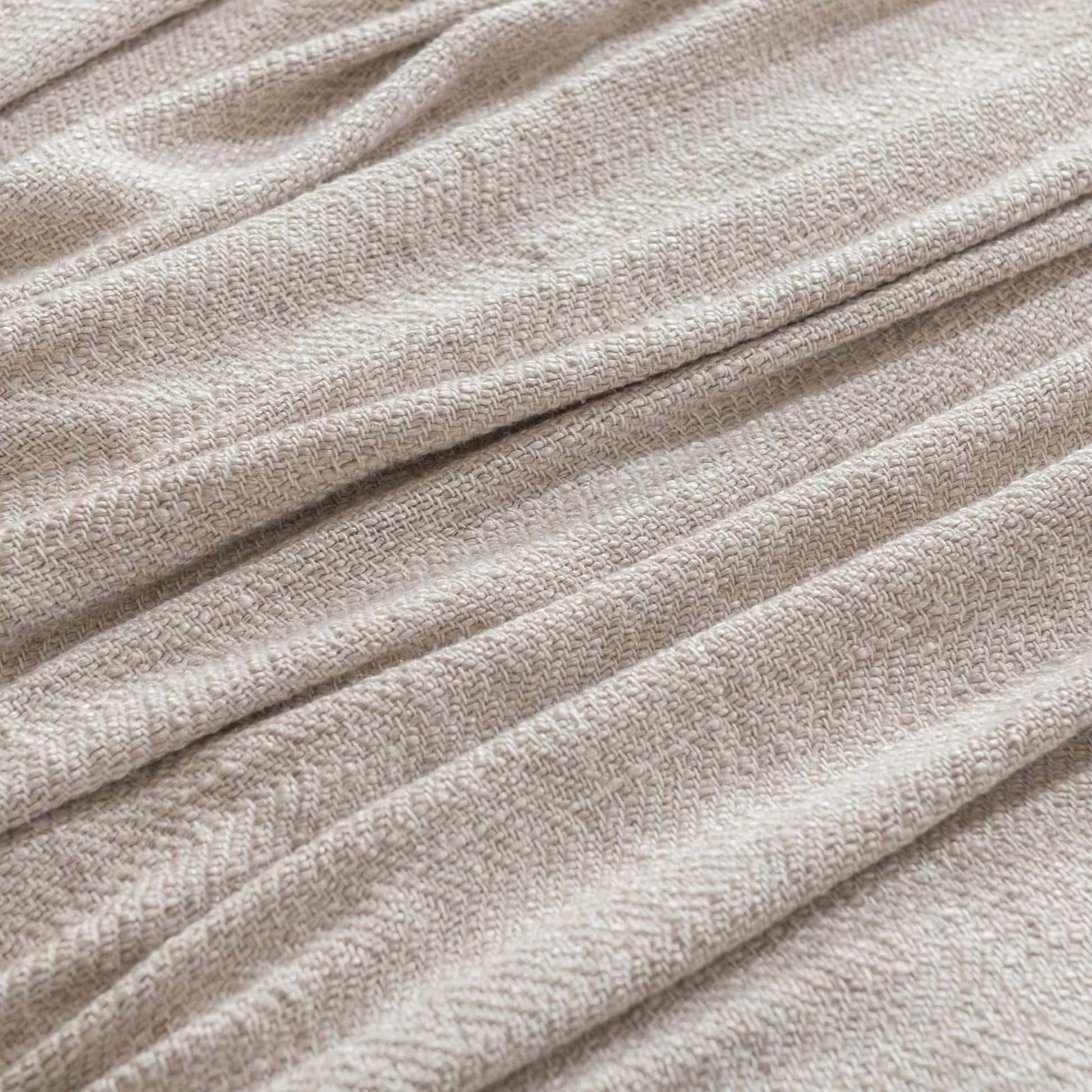 Avani Linen Blend Blanket by Villa by Classic Home in natural. Made from 80% viscose, 20% linen in a unique style.