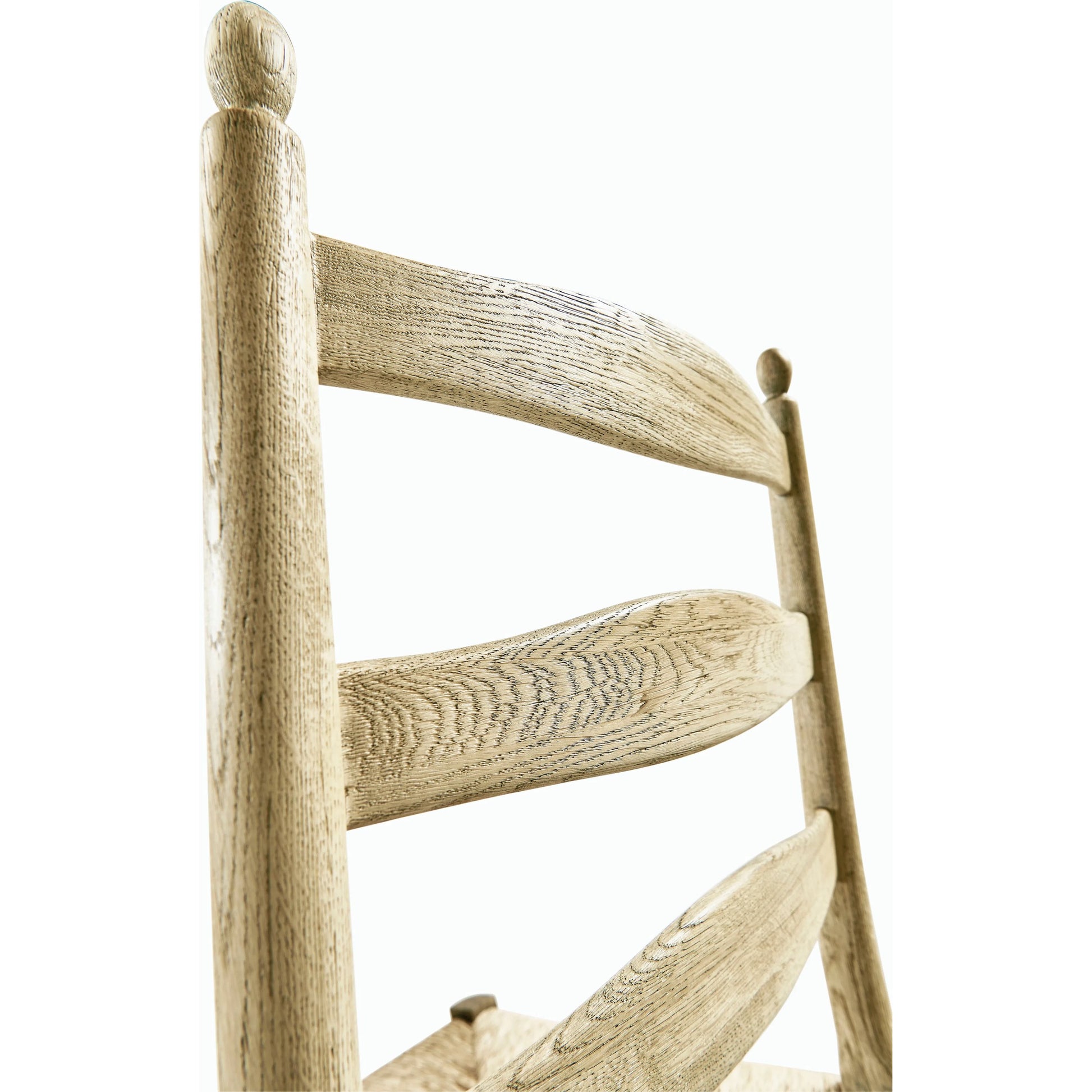 Timeless Doppler Ladderback Side Chair by Jonathan Charles in brown. Made from oak, fiber rush, foam, fabric in a coastal style.