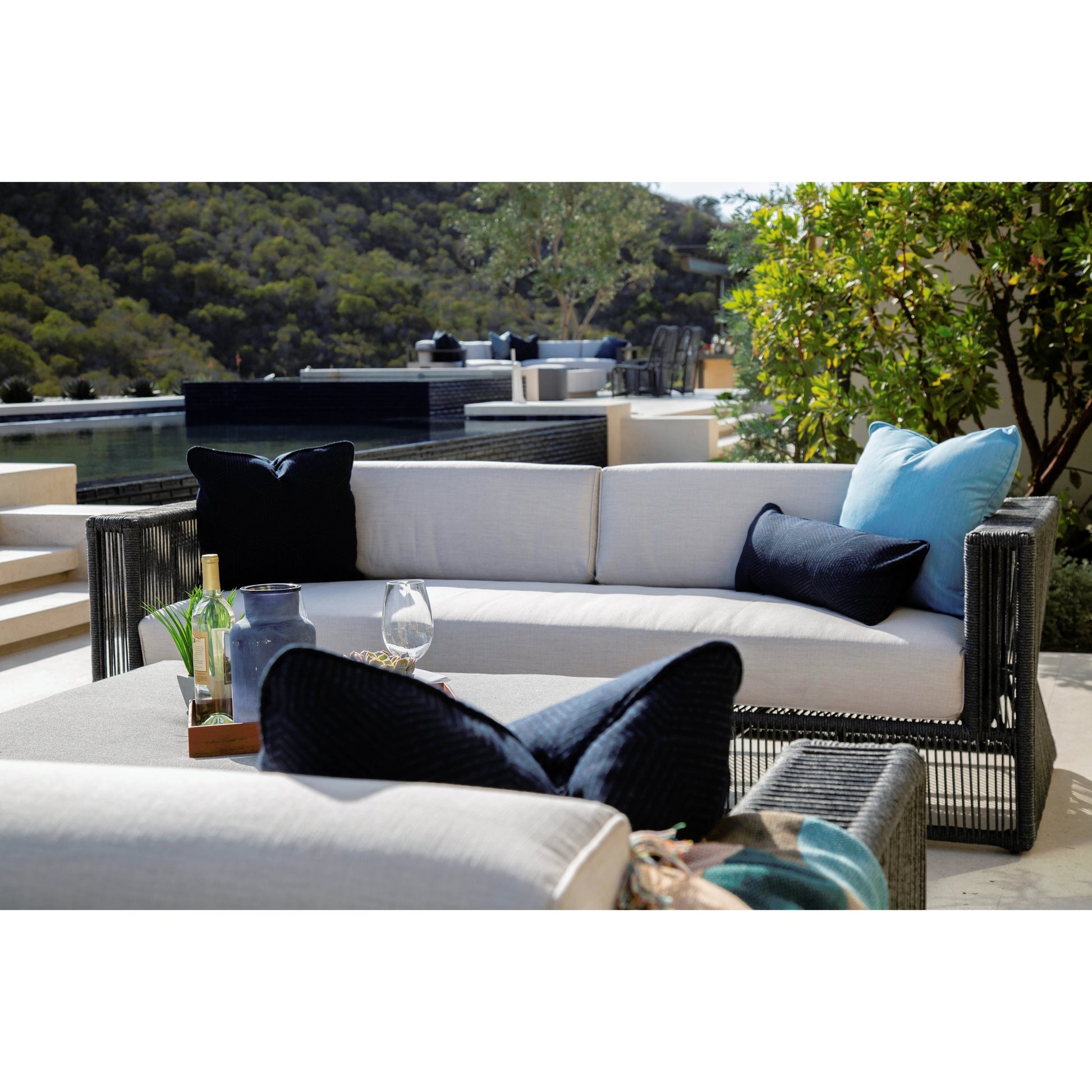 Milano Outdoor Sofa by Sunset West in slate. Made from olefin rope in a coastal style.