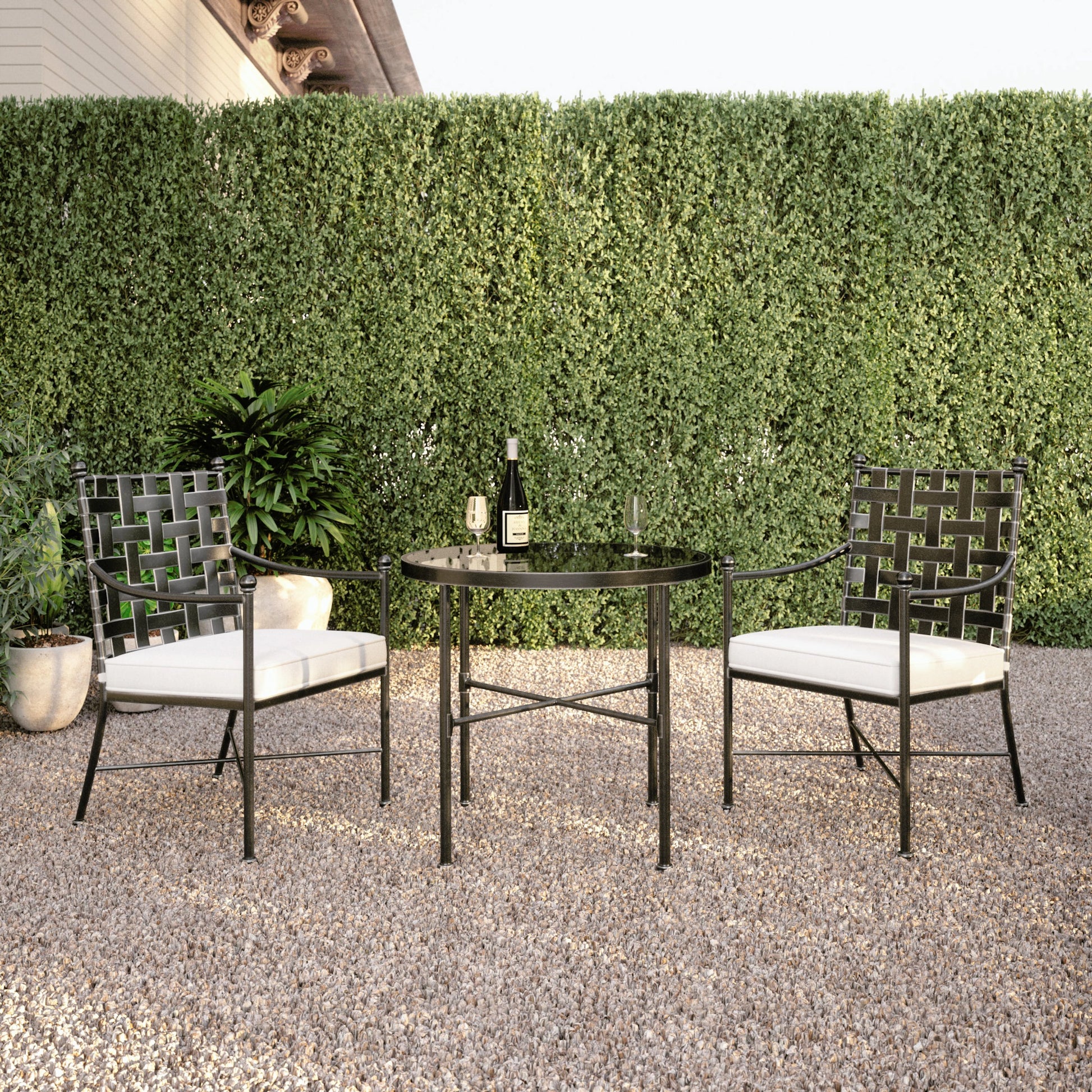 Provence Outdoor Bistro Table by Sunset West in pewter. Made from wrought iron in a modern style.