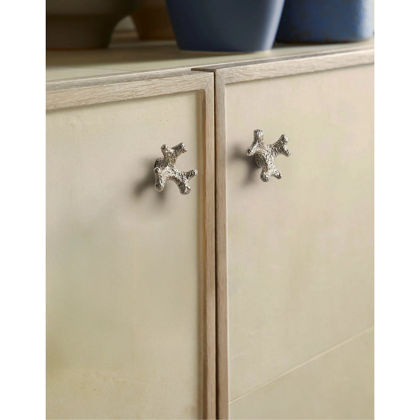 008 SI-2446826 | Closeup | Hydra Entertainment Console by Jonathan Charles in parchment oak. Made from oak, oak veneer, brass, vellum in a transitional style.