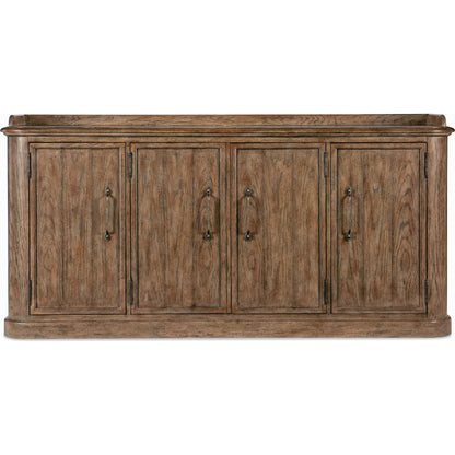Americana Four-Door Buffet by Hooker Furniture in brown and honey finish. Made from oak veneers with solid-wood edge top in a rustic style.