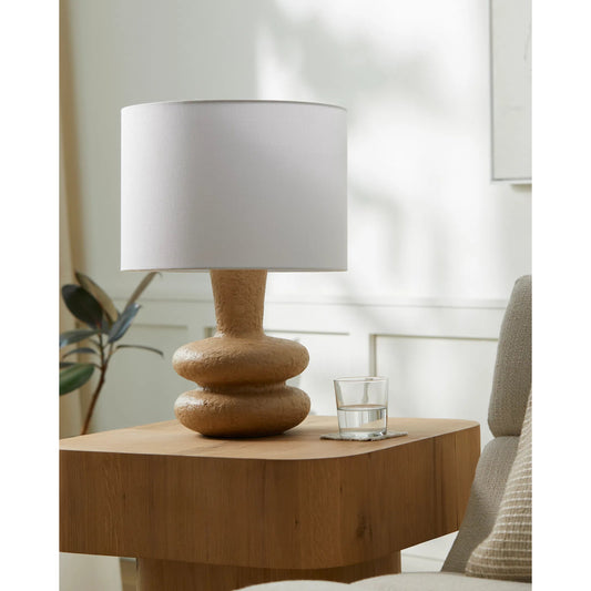 Vanda Accent Table Lamp 538359 by Livabliss in body: beige; base: beige; shade: white; finial: gold; harp: metallic - brass; cord: translucent and paintedpaintedplated. Made from ceramic, linen, polyester, iron in a unique styl
