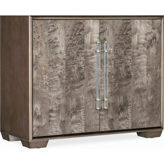 Melange Dorian Accent Chest by Hooker Furniture in medium wood and shimmery wood finish. Made from dyed brown burl figured veneer with maple veneers and acrylic pulls in a modern style.