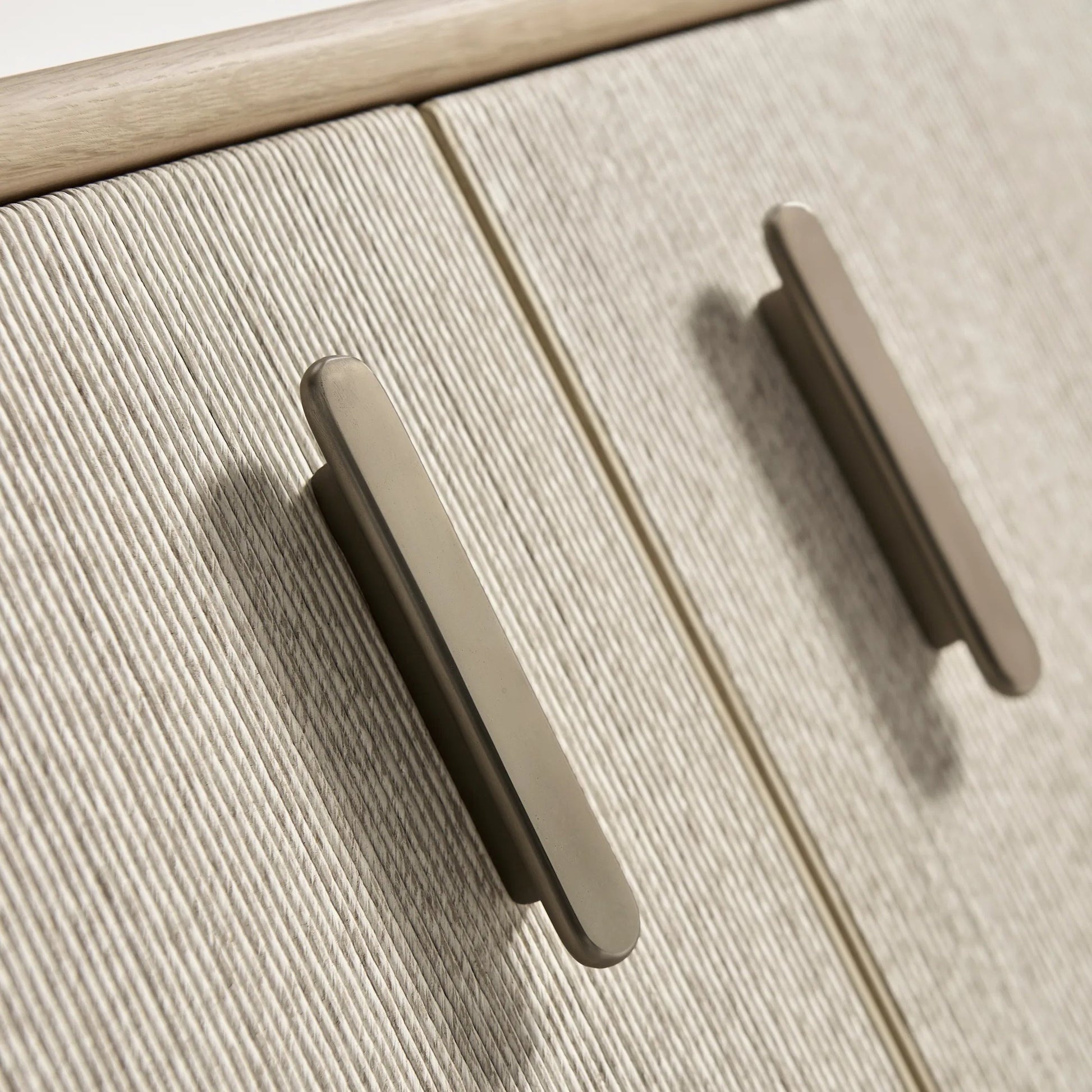 Clapotis Entertainment Console by Jonathan Charles in whitewash cord. Made from main rope in a unique style.