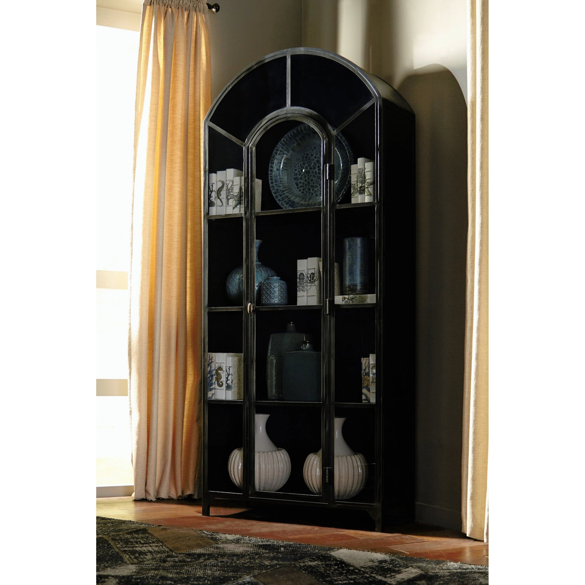 Belmont Cabinet by Four Hands. Made from iron in a transitional style.