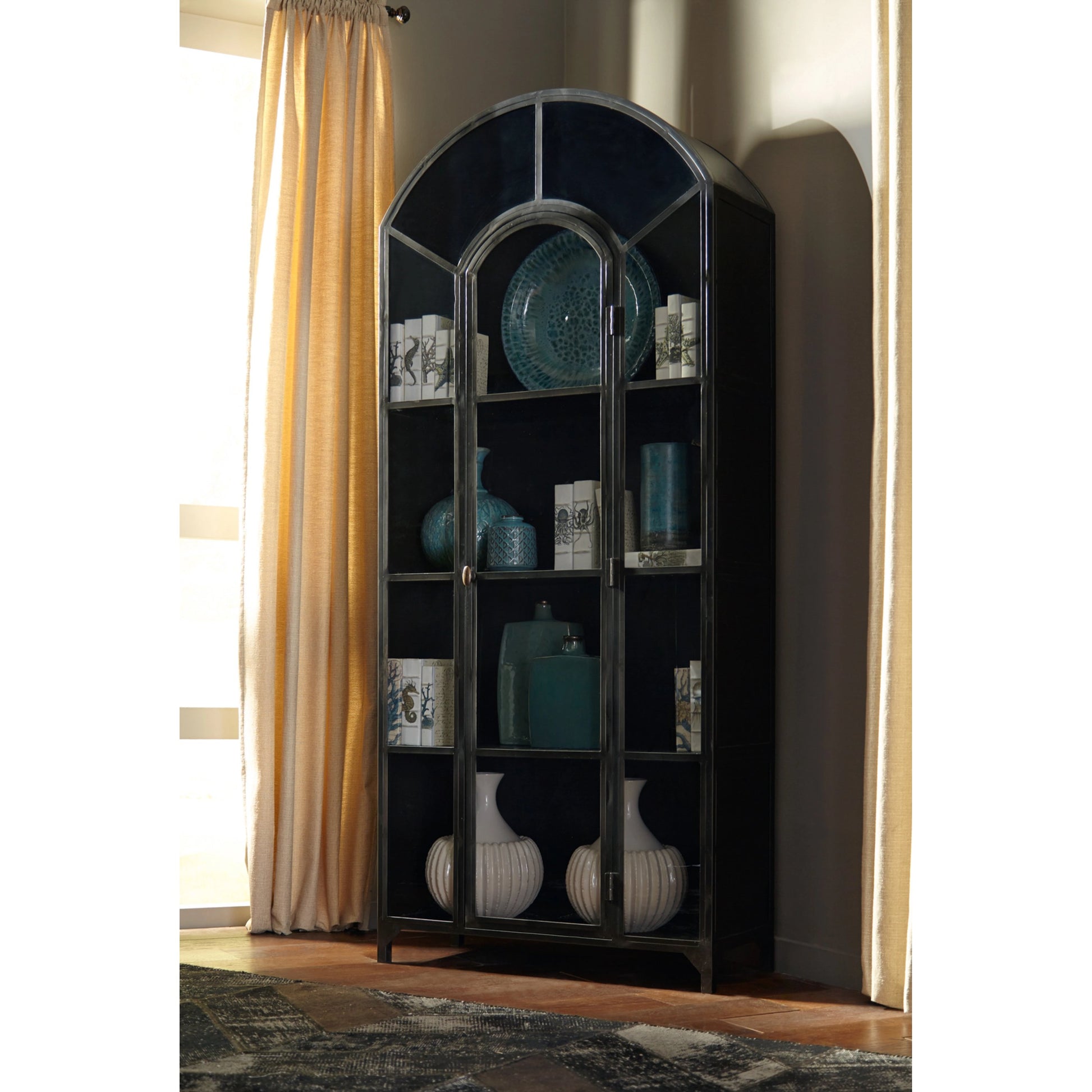 Belmont Cabinet by Four Hands. Made from iron in a transitional style.