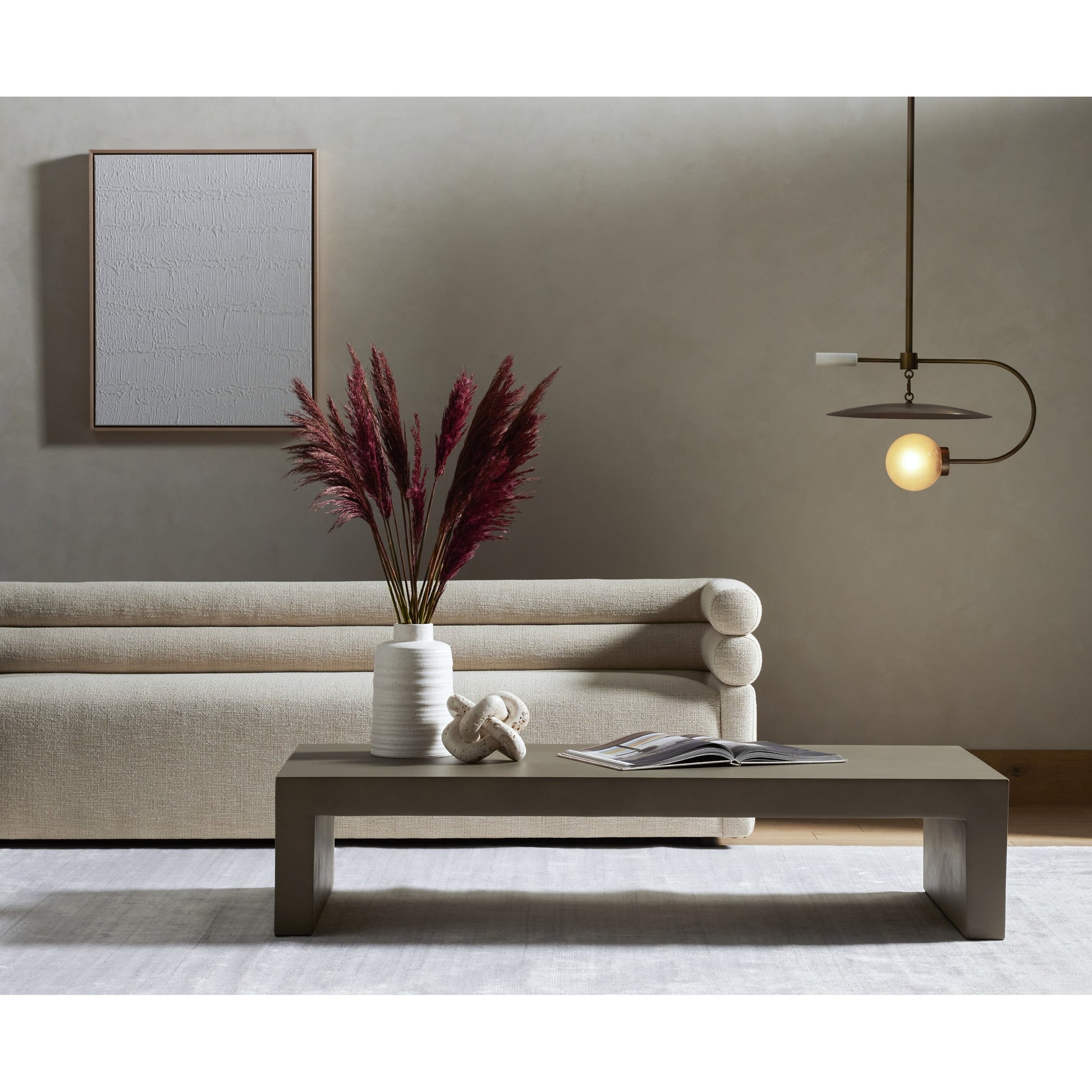 Parish Coffee Table by Four Hands. Made from concrete in a modern style.