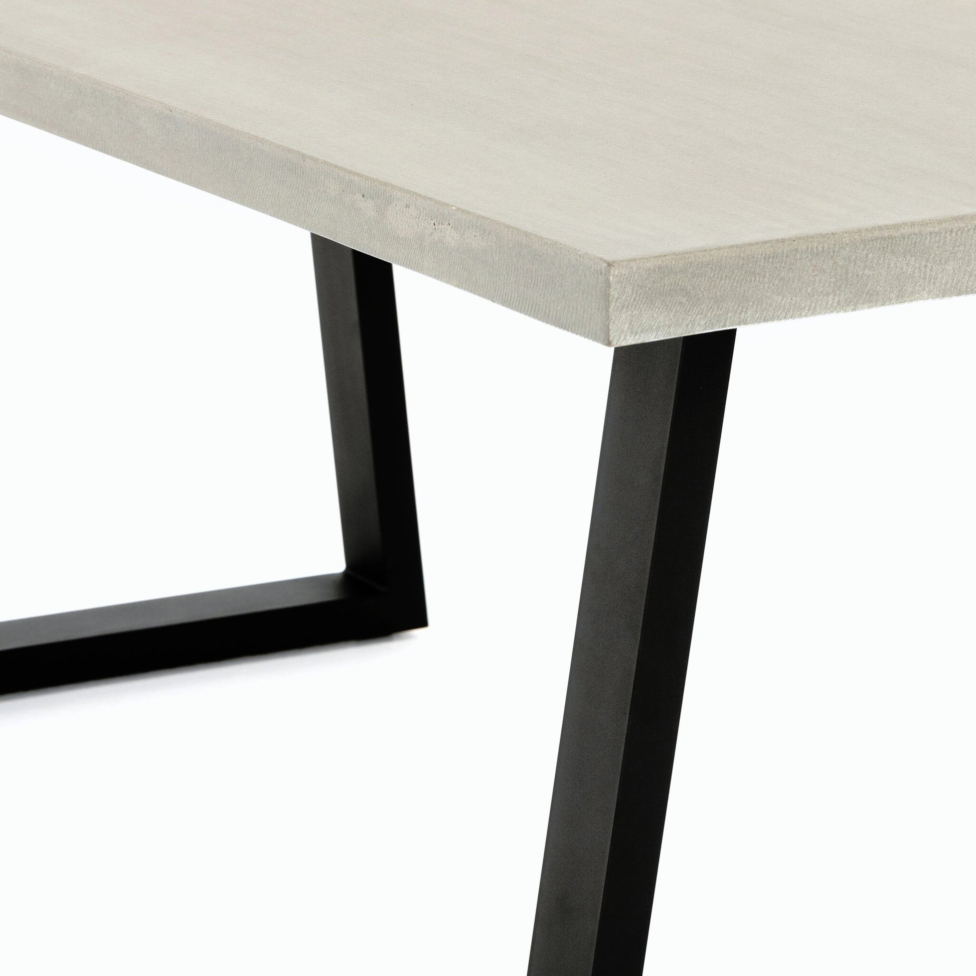 Cyrus Outdoor Dining Table by Four Hands in black, light gray. Made from lavastone composite, iron in a modern style.