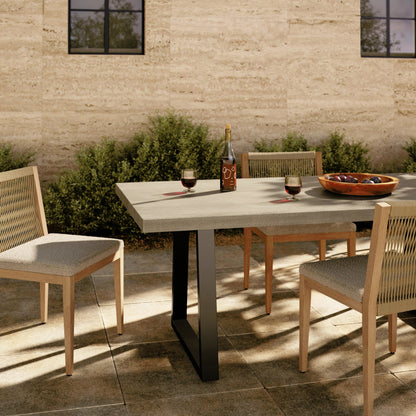 Cyrus Outdoor Dining Table by Four Hands in black, light gray. Made from lavastone composite, iron in a modern style.