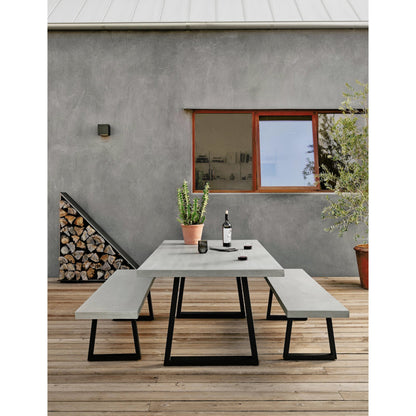 Cyrus Outdoor Dining Table by Four Hands in black, light gray. Made from lavastone composite, iron in a modern style.