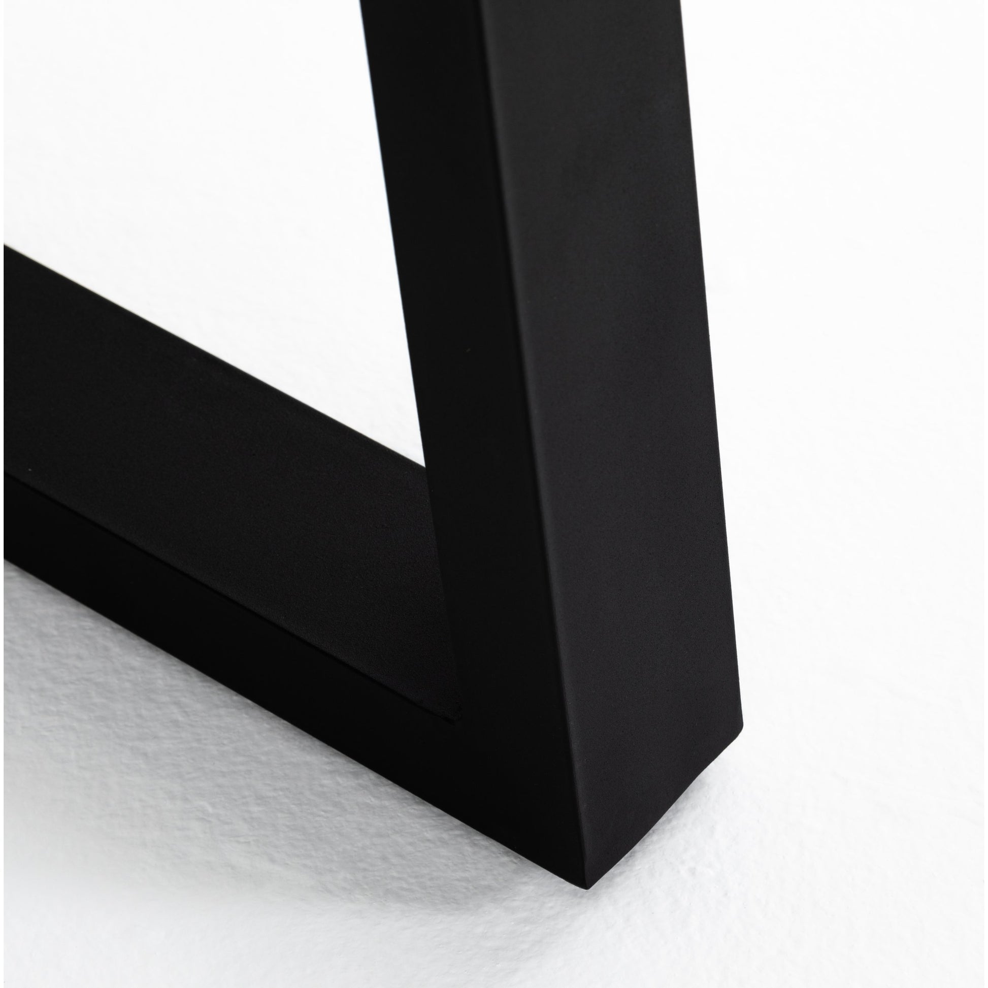 Cyrus Outdoor Dining Table by Four Hands in black, light gray. Made from lavastone composite, iron in a modern style.