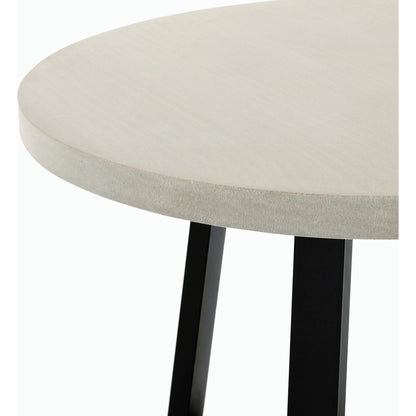 Cyrus Outdoor Round Dining Table by Four Hands. Made from lavastone composite, iron in a modern style.