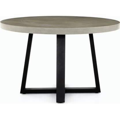Cyrus Outdoor Round Dining Table by Four Hands. Made from lavastone composite, iron in a modern style.