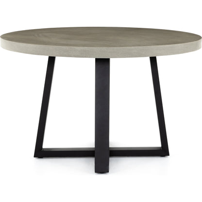 Cyrus Outdoor Round Dining Table by Four Hands. Made from lavastone composite, iron in a modern style.