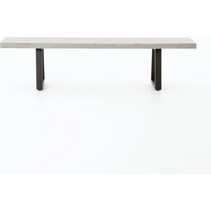 Cyrus Dining Bench by Four Hands in black and grey. Made from lavastone composite, iron in a modern style.