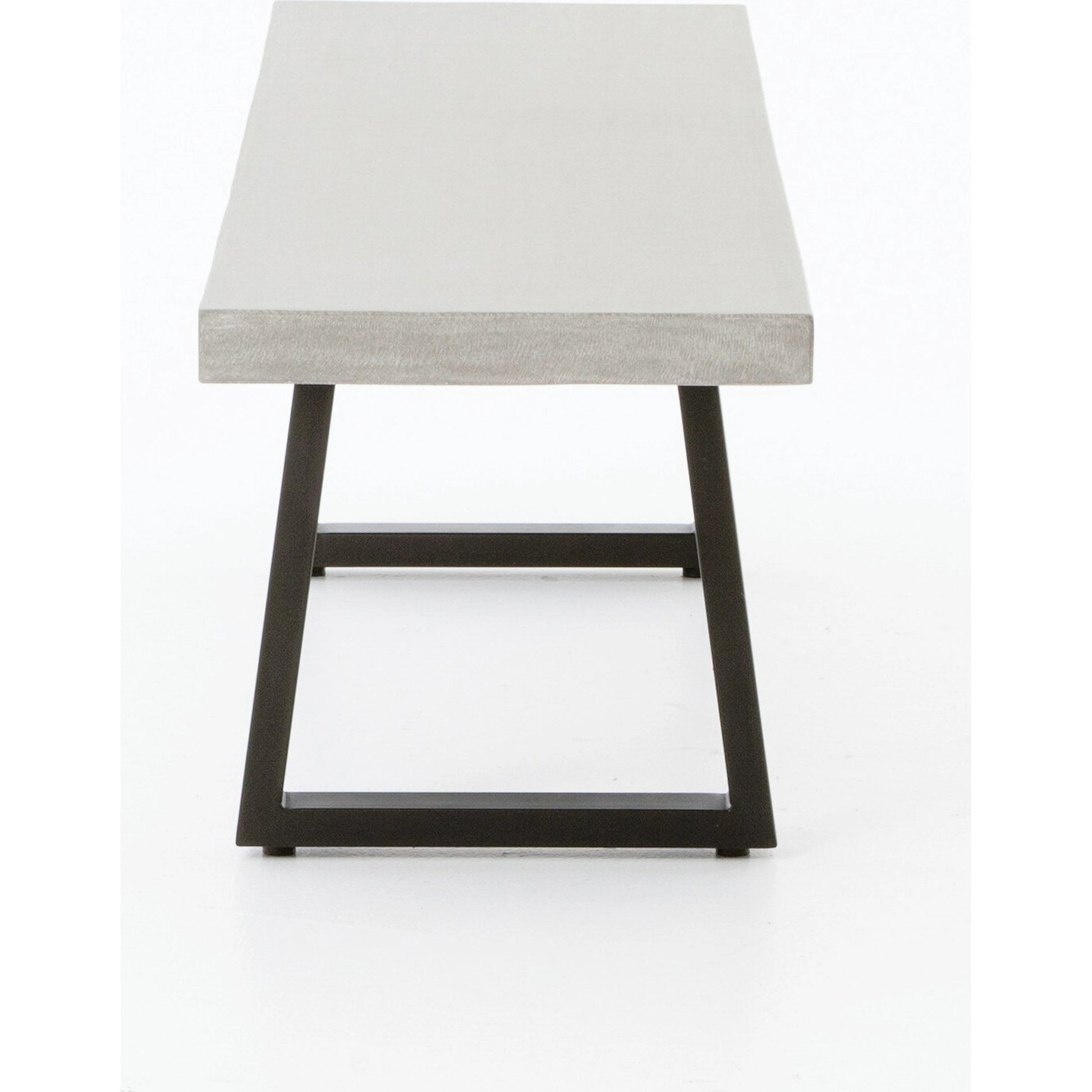Cyrus Dining Bench by Four Hands in black and grey. Made from lavastone composite, iron in a modern style.