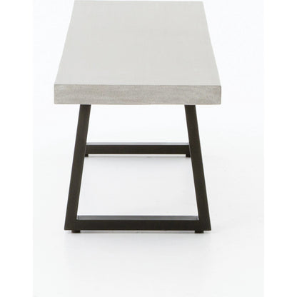 Cyrus Dining Bench by Four Hands in black and grey. Made from lavastone composite, iron in a modern style.