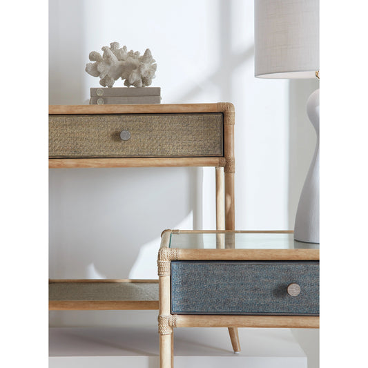 Retreat Pole Rattan Bedside Table by Hooker Furniture in green. Made from maple veneers, engineered raffia, rope, tempered glass in a cottage & farmhouse style.
