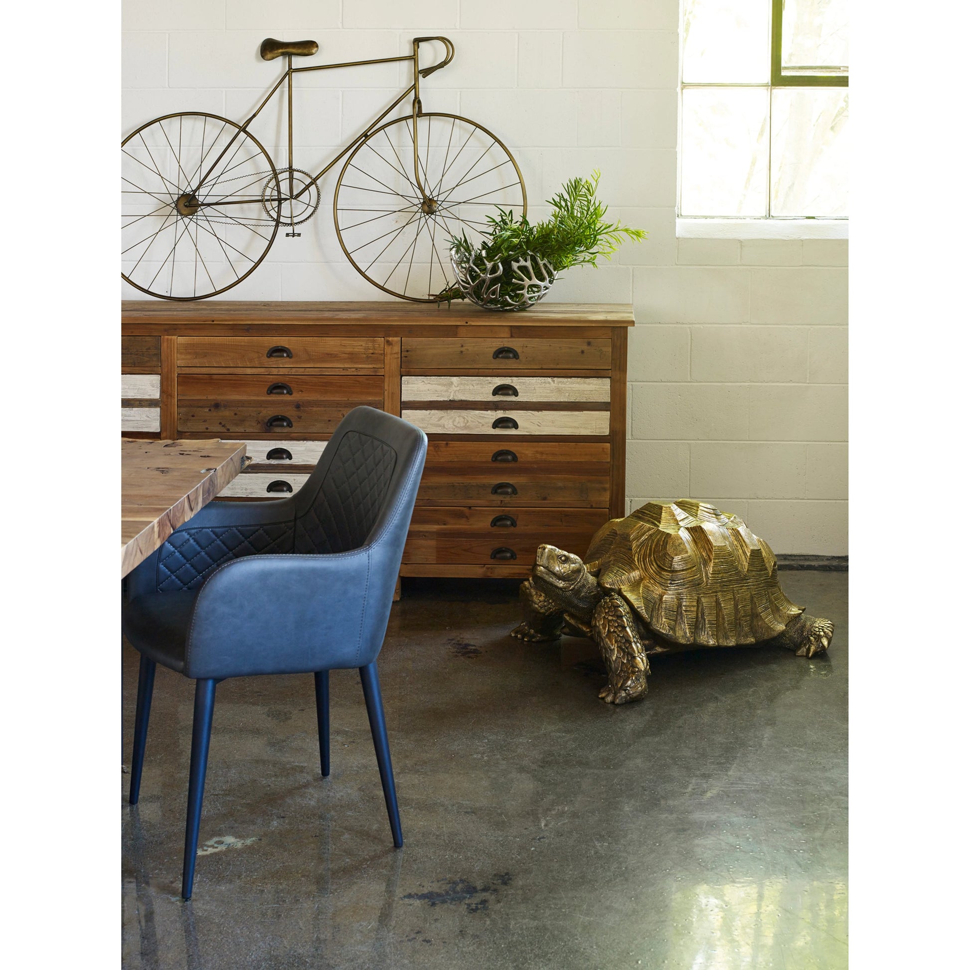 Bent Dining Table by Moe's Home Collection in brown. Made from solid acacia, iron base in a modern style.