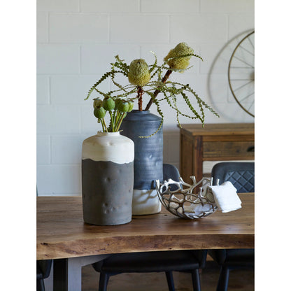 Bent Dining Table by Moe's Home Collection in brown. Made from solid acacia, iron base in a modern style.