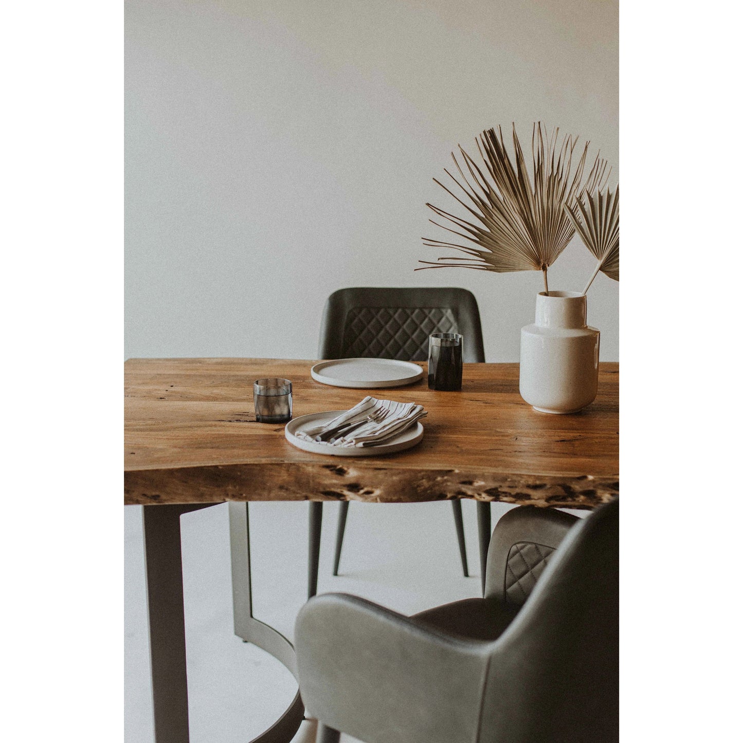 057 SI-2121872 | Lifestyle | Bent Dining Table by Moe's Home Collection in brown. Made from solid acacia, iron base in a modern style.