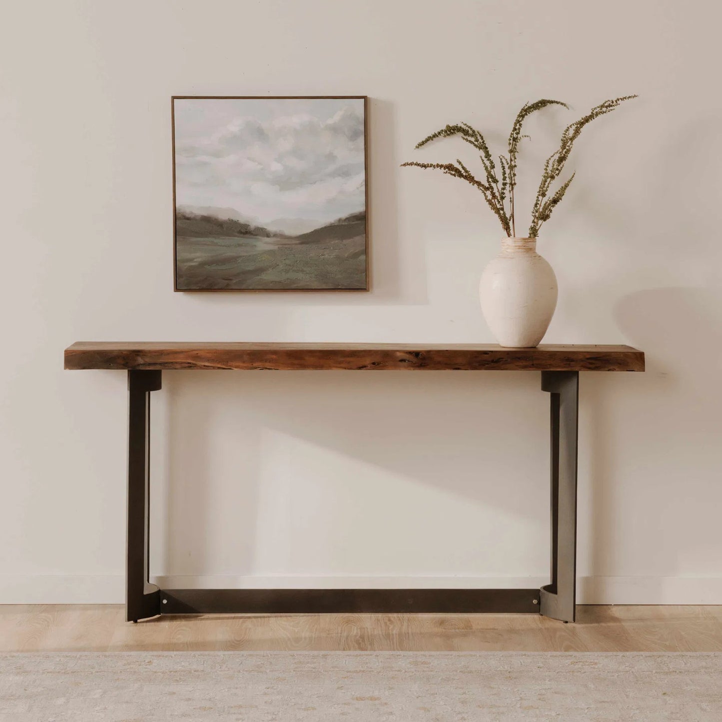 008 SI-2121868 | Lifestyle | Bent Console Table by Moe's Home Collection in brown. Made from solid acacia, iron base in a modern style.