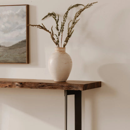 Bent Console Table by Moe's Home Collection in brown. Made from solid acacia, iron base in a modern style.
