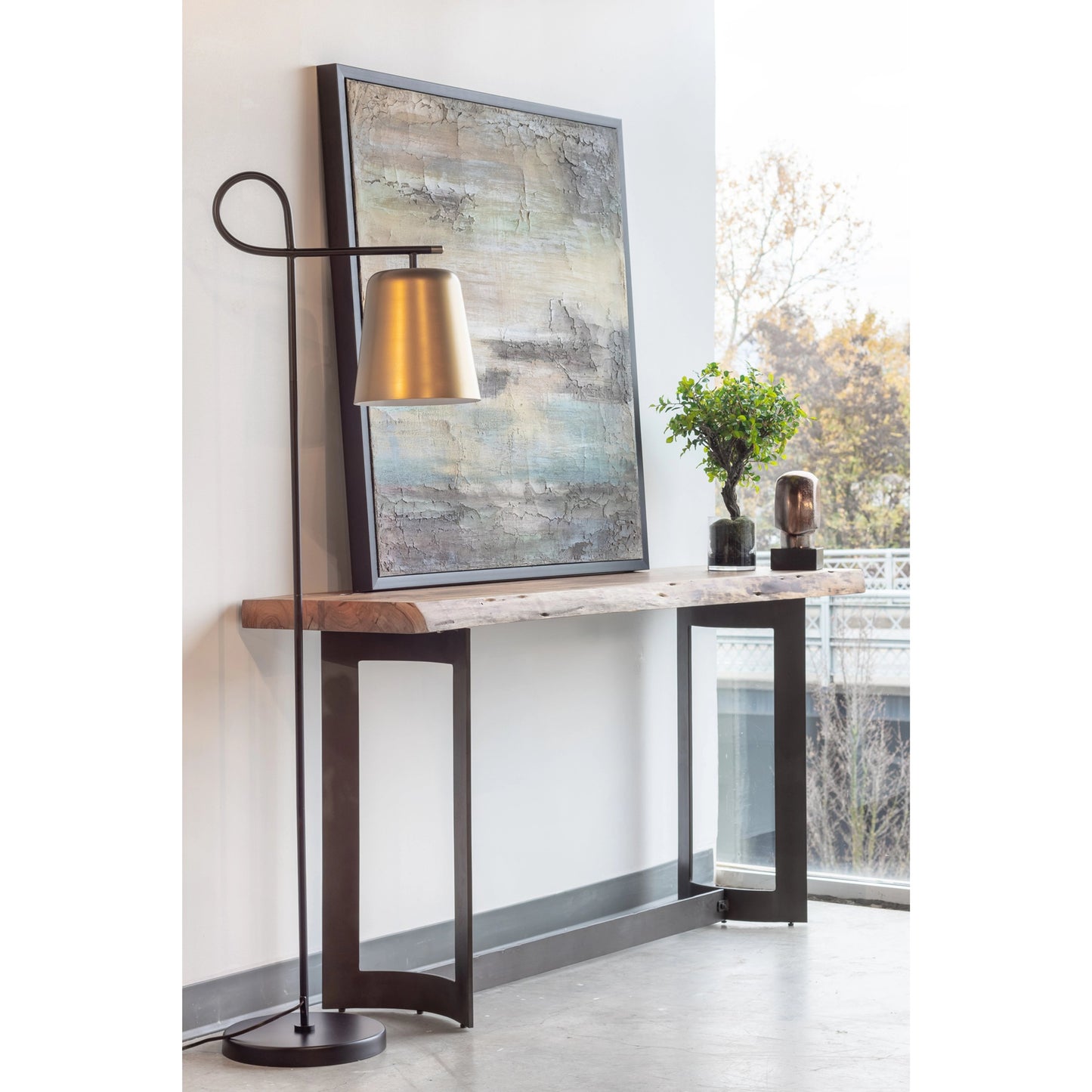 006 SI-2121868 | Lifestyle | Bent Console Table by Moe's Home Collection in brown. Made from solid acacia, iron base in a modern style.
