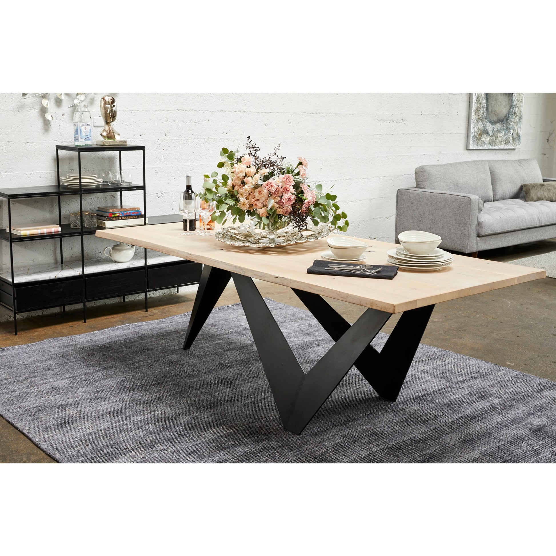Bird Dining Table by Moe's Home Collection in natural. Made from solid oak, iron base in a modern style.